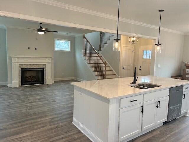 8860 Knolling Loop Unit 37, Ooltewah, TN 37363 - kitchen featuring a sink, dishwasher, crown molding, dark wood-type flooring, and white cabinetry