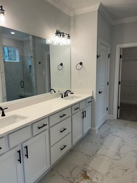 8860 Knolling Loop Unit 37, Ooltewah, TN 37363 - bathroom featuring a marble finish shower, ornamental molding, marble finish flooring, and double vanity