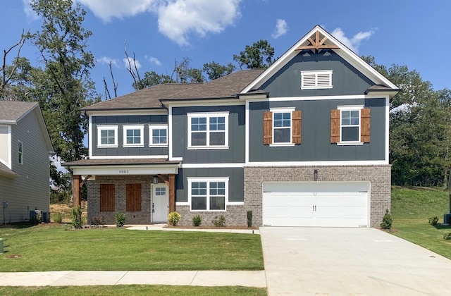 8860 Knolling Loop Unit 37, Ooltewah, TN 37363 - craftsman-style home with board and batten siding, brick siding, driveway, and a front yard