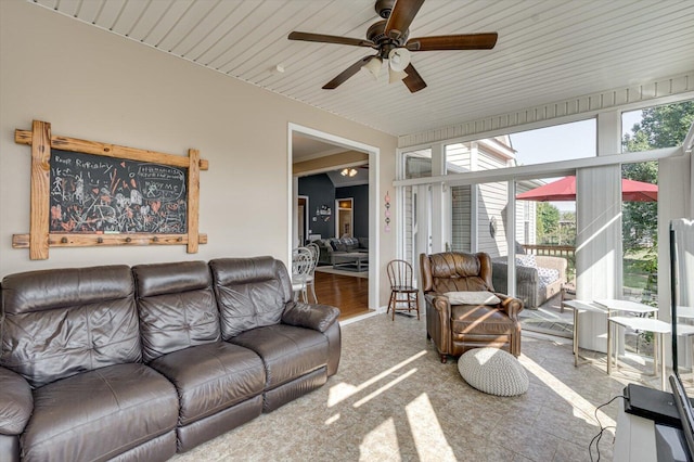 living room featuring a ceiling fan