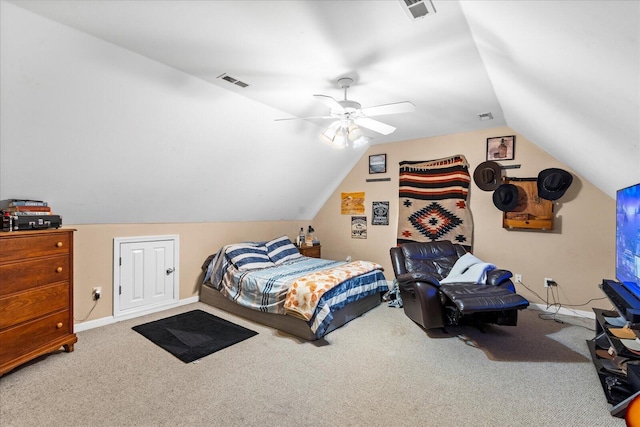 carpeted bedroom with vaulted ceiling and ceiling fan