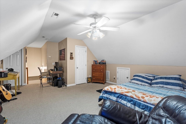 carpeted bedroom with a desk, lofted ceiling, a ceiling fan, and baseboards