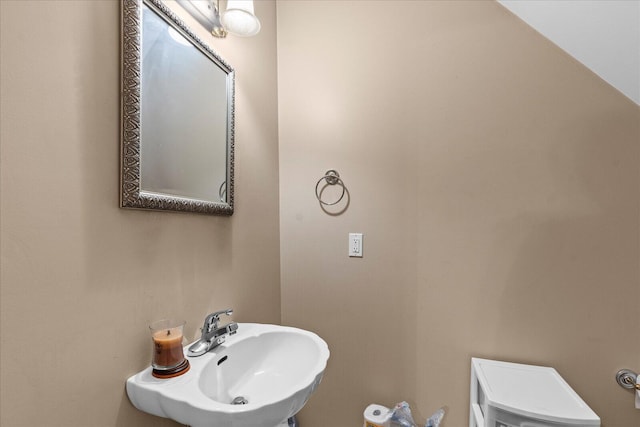 half bath with a sink