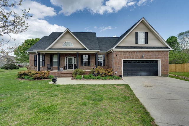view of front of home featuring brick siding, driveway, an attached garage, and a porch