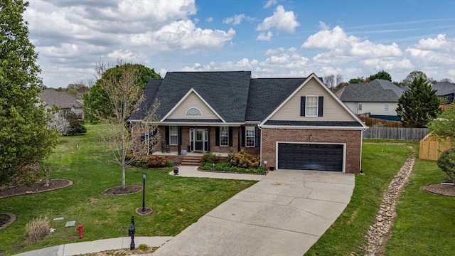 traditional-style home with covered porch, brick siding, driveway, and a garage