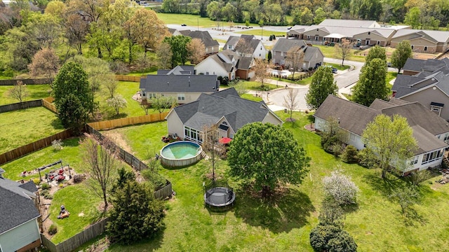 aerial perspective of suburban area with a pool area