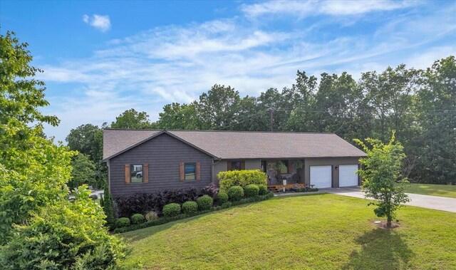 123 Paddle Wheel Ct, Cohutta, GA 30710 - view of front of property featuring an attached garage, concrete driveway, and a front lawn