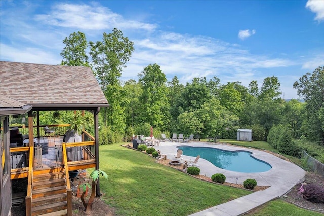 123 Paddle Wheel Ct, Cohutta, GA 30710 - view of pool with a wooden deck, a storage shed, a patio, a yard, and an outbuilding