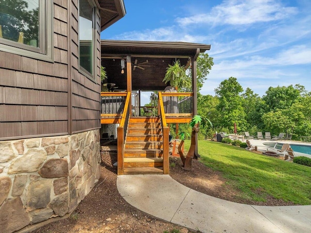 123 Paddle Wheel Ct, Cohutta, GA 30710 - view of playground featuring a swimming pool, ceiling fan, a lawn, and a patio area