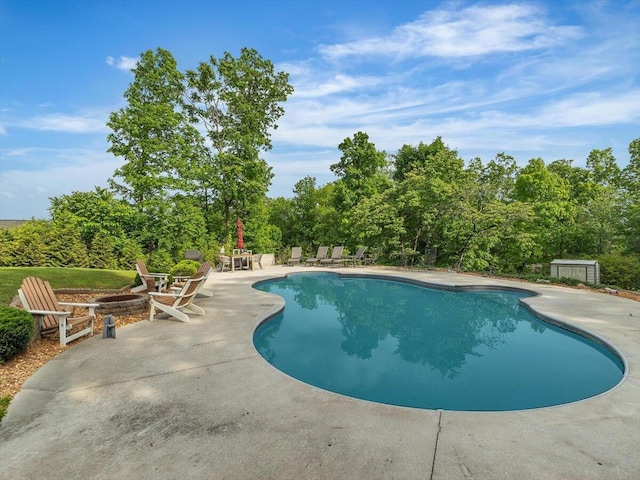 123 Paddle Wheel Ct, Cohutta, GA 30710 - swimming pool featuring a patio and an outdoor fire pit