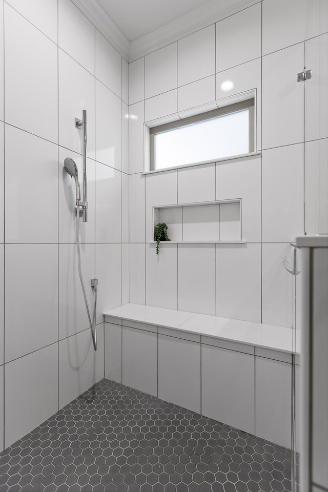 full bathroom with a tile shower