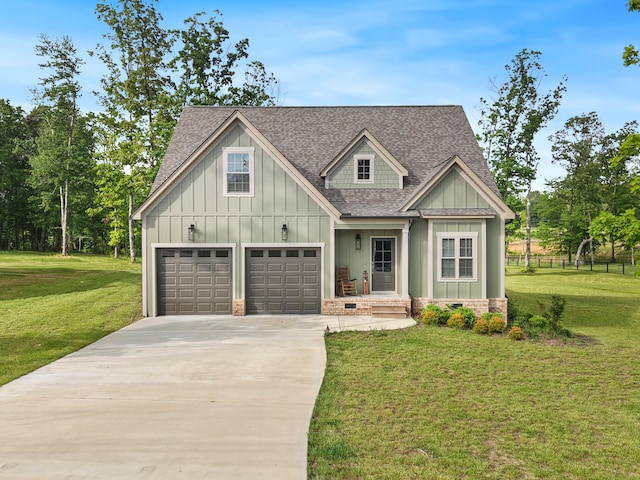 2664 Mowbray Pike Unit 2, Soddy Daisy, TN 37379 - view of front of home featuring a shingled roof, board and batten siding, concrete driveway, a front lawn, and an attached garage