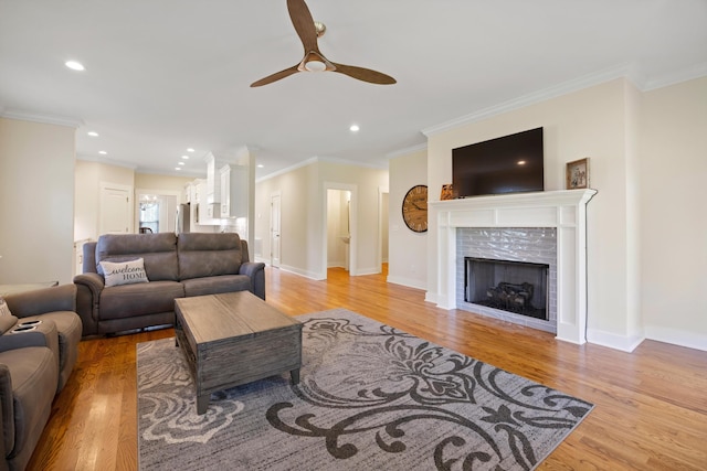 2664 Mowbray Pike Unit 2, Soddy Daisy, TN 37379 - living area featuring a ceiling fan, wood finished floors, recessed lighting, crown molding, and a tile fireplace