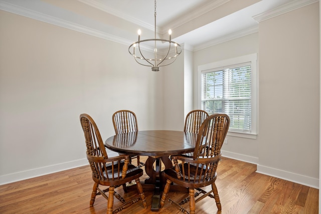 2664 Mowbray Pike Unit 2, Soddy Daisy, TN 37379 - dining area with light wood finished floors, ornamental molding, a chandelier, and baseboards