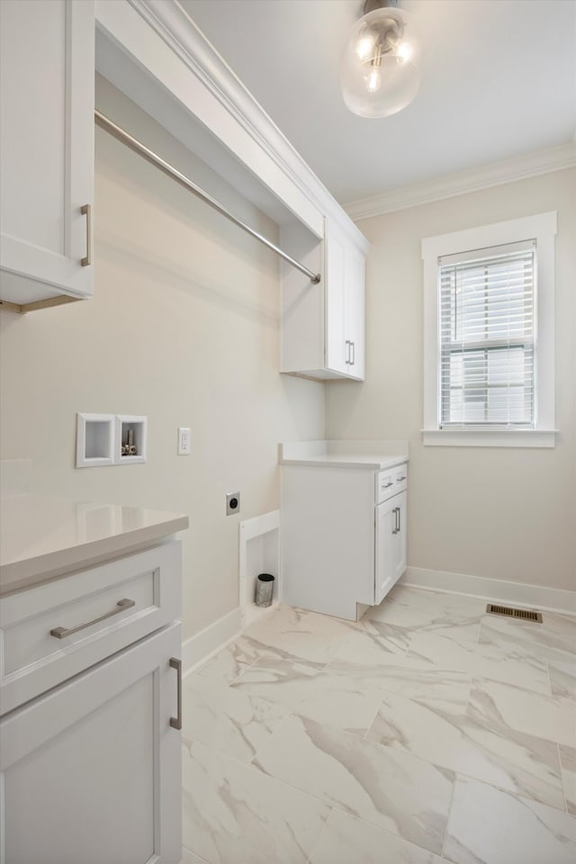 2664 Mowbray Pike Unit 2, Soddy Daisy, TN 37379 - laundry room featuring electric dryer hookup, ornamental molding, cabinet space, baseboards, and washer hookup