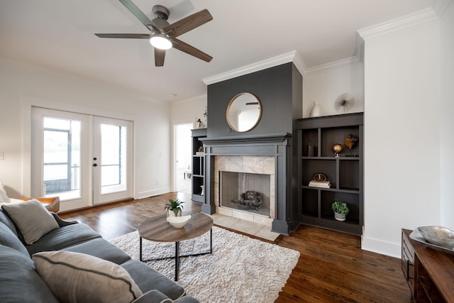 3637 Stickley Way, Apison, TN 37302 - living room with wood finished floors, ornamental molding, ceiling fan, french doors, and a tile fireplace