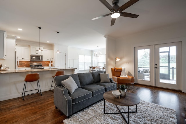 3637 Stickley Way, Apison, TN 37302 - living area with dark wood-type flooring, plenty of natural light, crown molding, ceiling fan, and recessed lighting