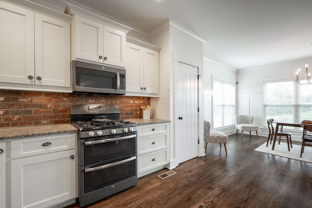3637 Stickley Way, Apison, TN 37302 - kitchen featuring stainless steel appliances, white cabinets, decorative backsplash, dark wood finished floors, and crown molding