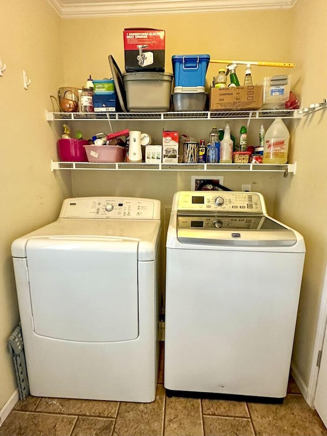 2218 Harvest Ln, Dandridge, TN 37725 - clothes washing area featuring washer and dryer, crown molding, and baseboards