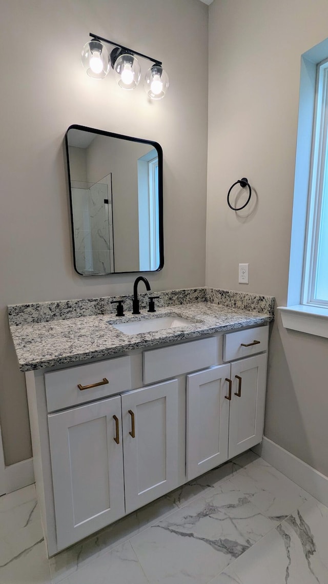 9162 Fuller Rd, Chattanooga, TN 37421 - bathroom featuring marble look tile flooring and vanity