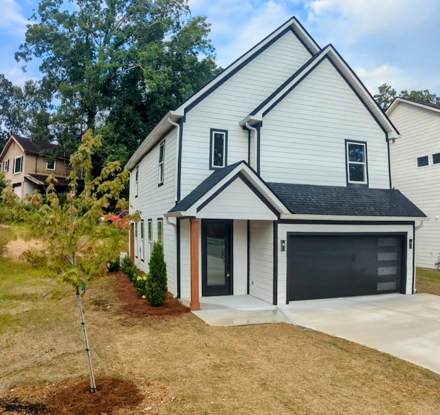 9162 Fuller Rd, Chattanooga, TN 37421 - view of front of house with driveway and a garage