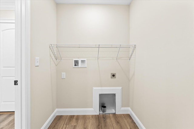 118 Earls Way, Chatsworth, GA 30705 - laundry area with wood finished floors, electric dryer hookup, hookup for a washing machine, and baseboards