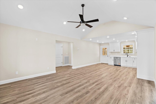 118 Earls Way, Chatsworth, GA 30705 - unfurnished living room with a ceiling fan, recessed lighting, light wood-type flooring, baseboards, and high vaulted ceiling