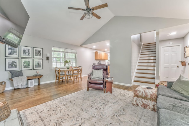 4950 Standifer Rd, Cohutta, GA 30710 - living room with ceiling fan, stairs, high vaulted ceiling, wood finished floors, and baseboards