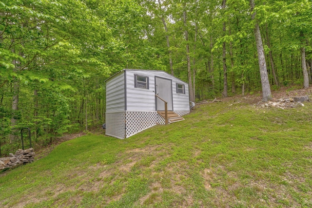 4950 Standifer Rd, Cohutta, GA 30710 - view of outbuilding with entry steps, a wooded view, and an outbuilding