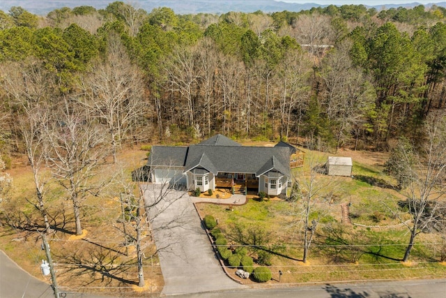 view from above of property featuring a forest