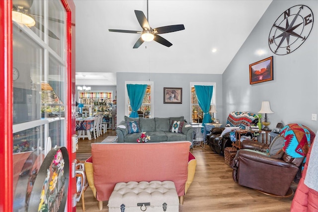 132 Katie Ln, Chatsworth, GA 30705 - living room with ceiling fan, wood finished floors, a chandelier, and high vaulted ceiling