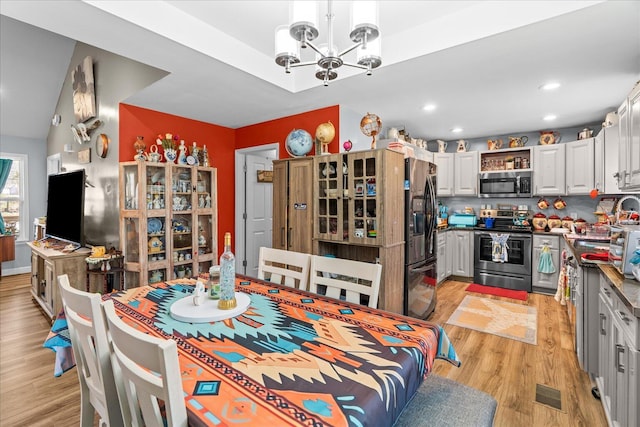 132 Katie Ln, Chatsworth, GA 30705 - dining room featuring a chandelier, light wood-type flooring, and recessed lighting