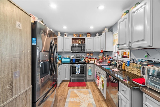 132 Katie Ln, Chatsworth, GA 30705 - kitchen featuring appliances with stainless steel finishes, light wood-type flooring, recessed lighting, and open shelves