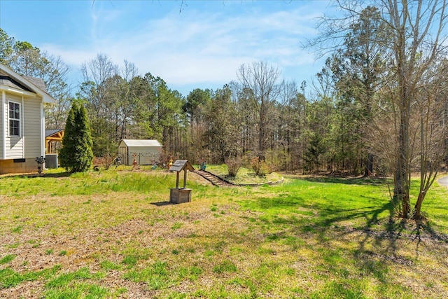 132 Katie Ln, Chatsworth, GA 30705 - view of green lawn with a shed