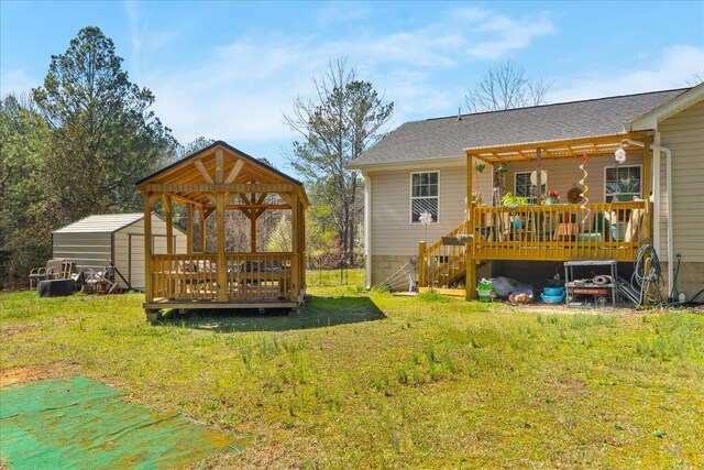 132 Katie Ln, Chatsworth, GA 30705 - back of house featuring a wooden deck, a gazebo, a storage shed, a yard, and stairway