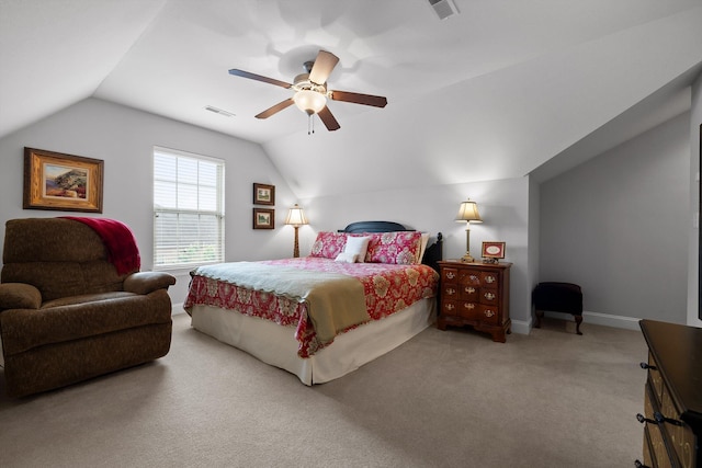 bedroom featuring vaulted ceiling, carpet, a ceiling fan, and baseboards