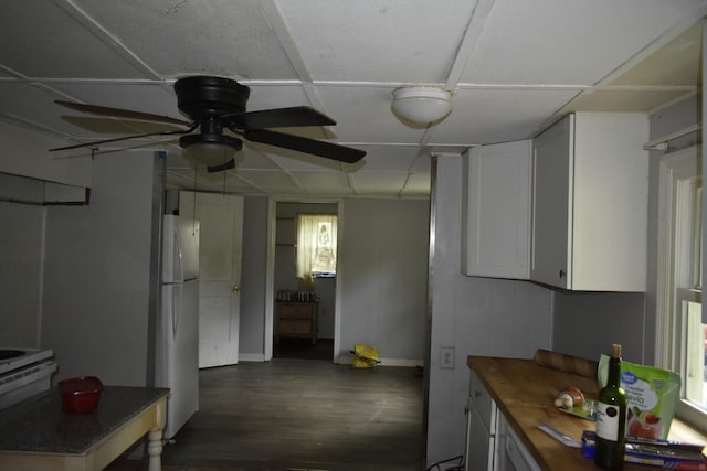 170 Lavenia Cir, Chickamauga, GA 30707 - kitchen featuring freestanding refrigerator, dark wood-style floors, butcher block counters, ceiling fan, and white cabinets