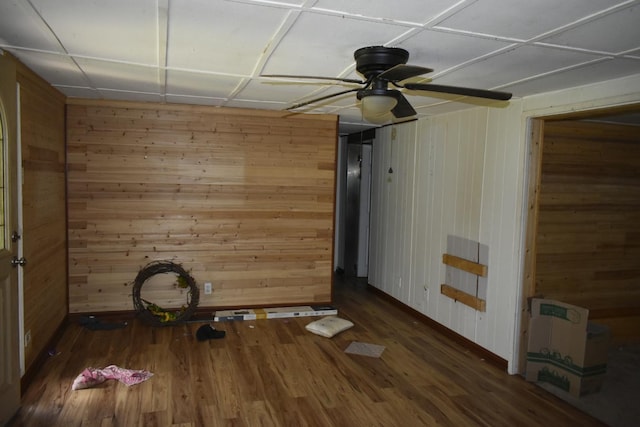 170 Lavenia Cir, Chickamauga, GA 30707 - empty room with wood walls, a ceiling fan, wood finished floors, and baseboards