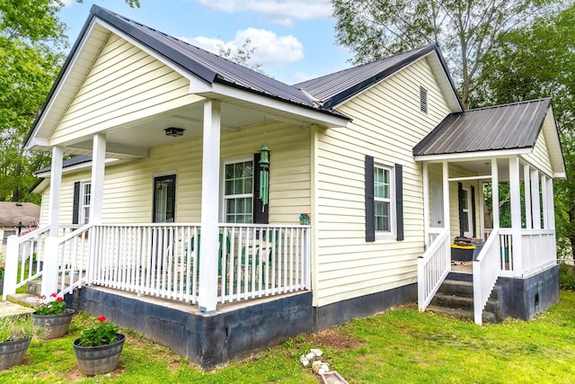 301 Cedar St, Lafayette, GA 30728 - view of property exterior with a porch and metal roof