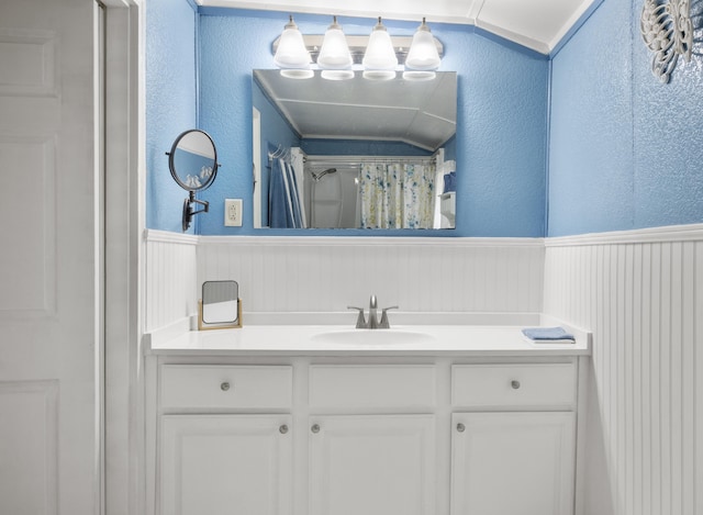 301 Cedar St, Lafayette, GA 30728 - full bath featuring wainscoting, a textured wall, vanity, and curtained shower