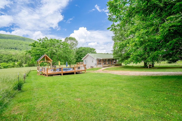 976 Chamberlain Rd, Lafayette, GA 30728 - view of grassy yard with a deck
