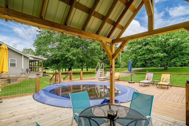 976 Chamberlain Rd, Lafayette, GA 30728 - deck featuring outdoor dining space, a yard, view of scattered trees, and a covered pool
