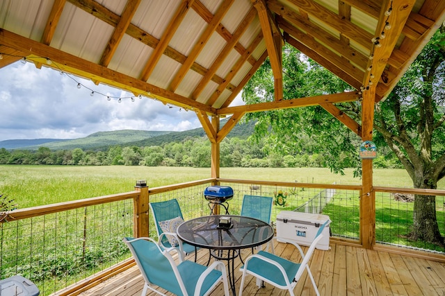 976 Chamberlain Rd, Lafayette, GA 30728 - wooden terrace featuring outdoor dining area, a mountain view, and a wooded view