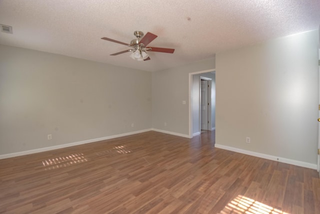 2204 Old Ivy Way Apt 3, Dalton, GA 30720 - unfurnished room featuring ceiling fan, wood finished floors, baseboards, and a textured ceiling
