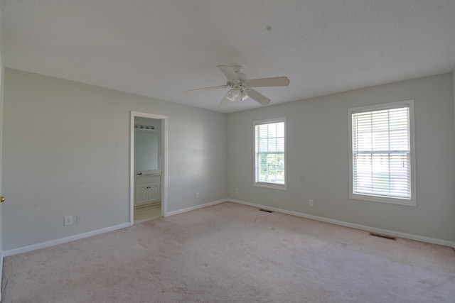 2204 Old Ivy Way Apt 3, Dalton, GA 30720 - spare room featuring carpet flooring, a ceiling fan, and baseboards