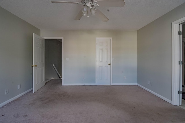 2204 Old Ivy Way Apt 3, Dalton, GA 30720 - unfurnished bedroom with carpet floors, baseboards, a textured ceiling, and a ceiling fan