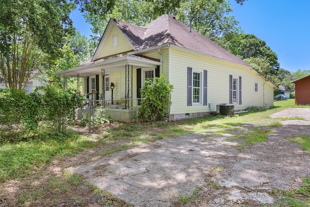 506 Daugherty St, Lafayette, GA 30728 - view of front of house with a porch, central AC unit, crawl space, and a shingled roof