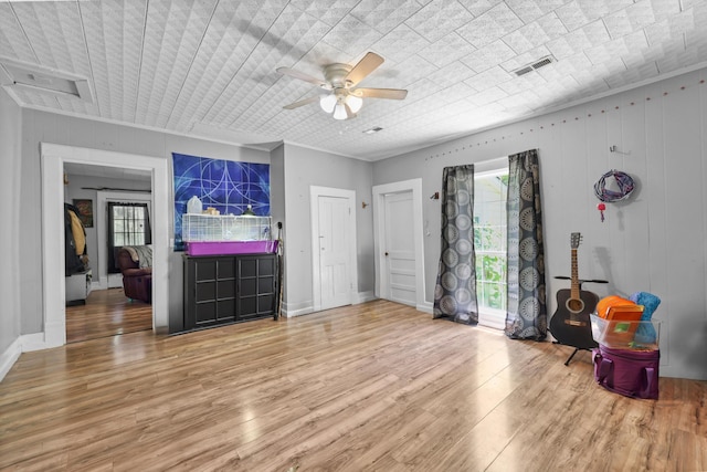 506 Daugherty St, Lafayette, GA 30728 - living room featuring wood finished floors, a ceiling fan, and baseboards