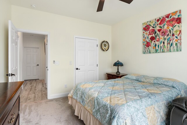 5834 Caney Ridge Cir, Ooltewah, TN 37363 - carpeted bedroom with baseboards and a ceiling fan