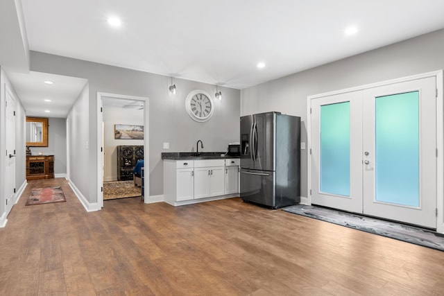 5834 Caney Ridge Cir, Ooltewah, TN 37363 - kitchen featuring stainless steel fridge with ice dispenser, french doors, dark countertops, dark wood-style floors, and recessed lighting